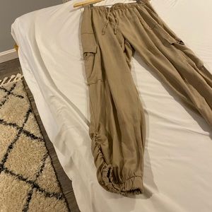 New never worn cotton parachute pants. Gathered detail at ankles size XL